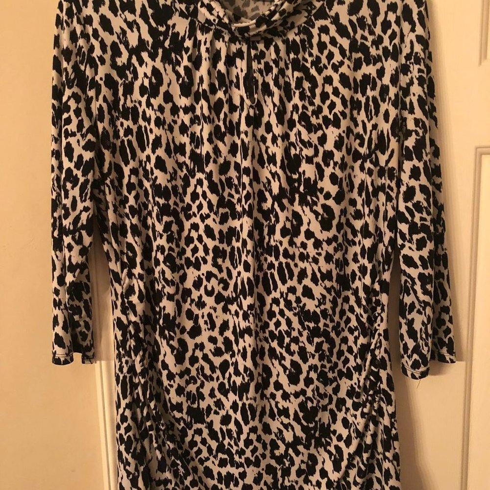 NY & CO animal print turtleneck blouse